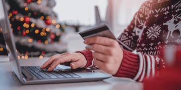 A woman holiday shopping online