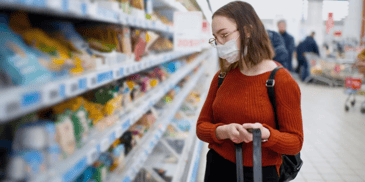 A woman shopping in the grocery store