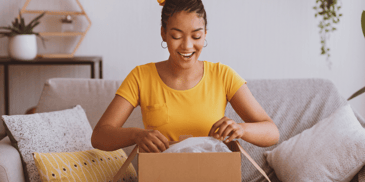 A woman unboxing a package