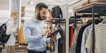 individual checking ipad for inventory count