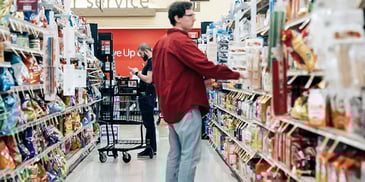 Man grocery shopping