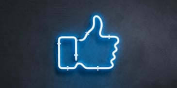 facebook like icon represented by a neon sign